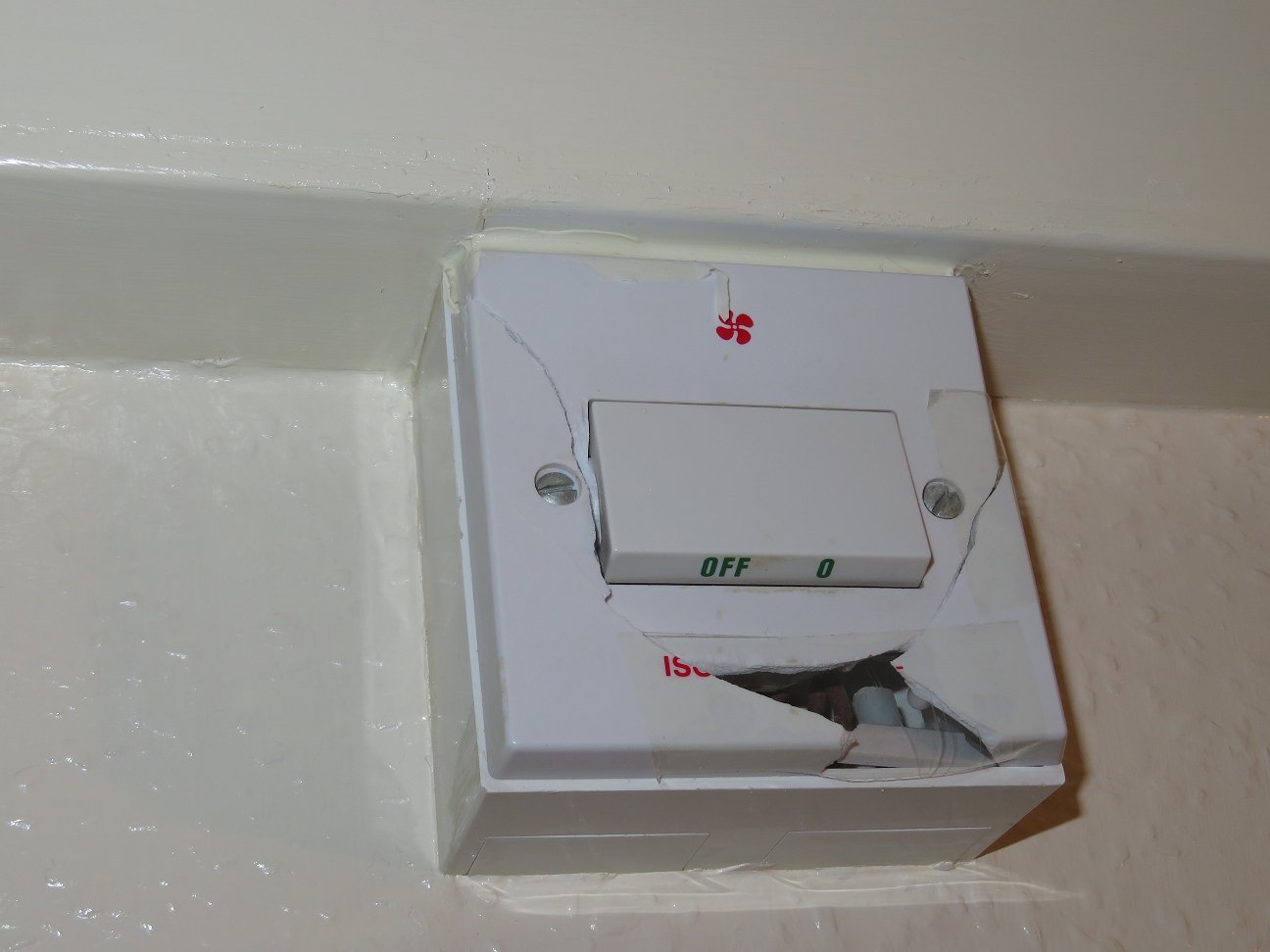 Fixing a cracked bathroom extractor fan "isolator" switch cover