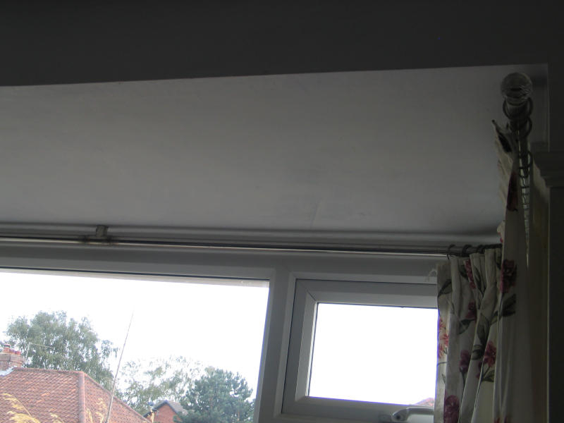 Can you talk me through how to put curtains up in bay window please